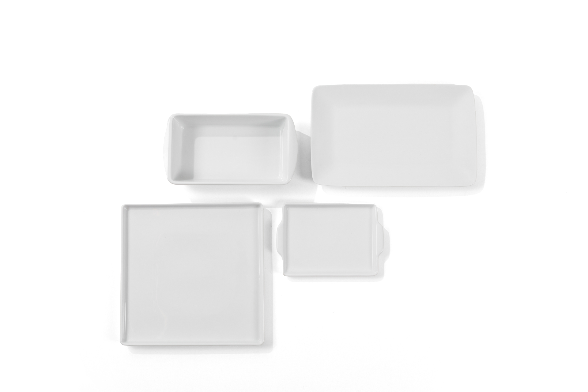 REF 3926 - Assadeira Retangular Porcelana P 24 Cm X 13 Cm<br />
REF 3925 - Bandeja Branca Porcelana Quadrada 26 Cm X 26 Cm<br />
REF 3924 - Bandeja Branca Porcelana Retangular M 31 Cm X 19 Cm<br />
REF 3923 - Bandeja Branca Porcelana Retangular P 20 Cm X 13 Cm